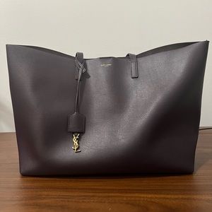 Authentic Saint Laurent East West Shopper in Aubergine. Good condition.